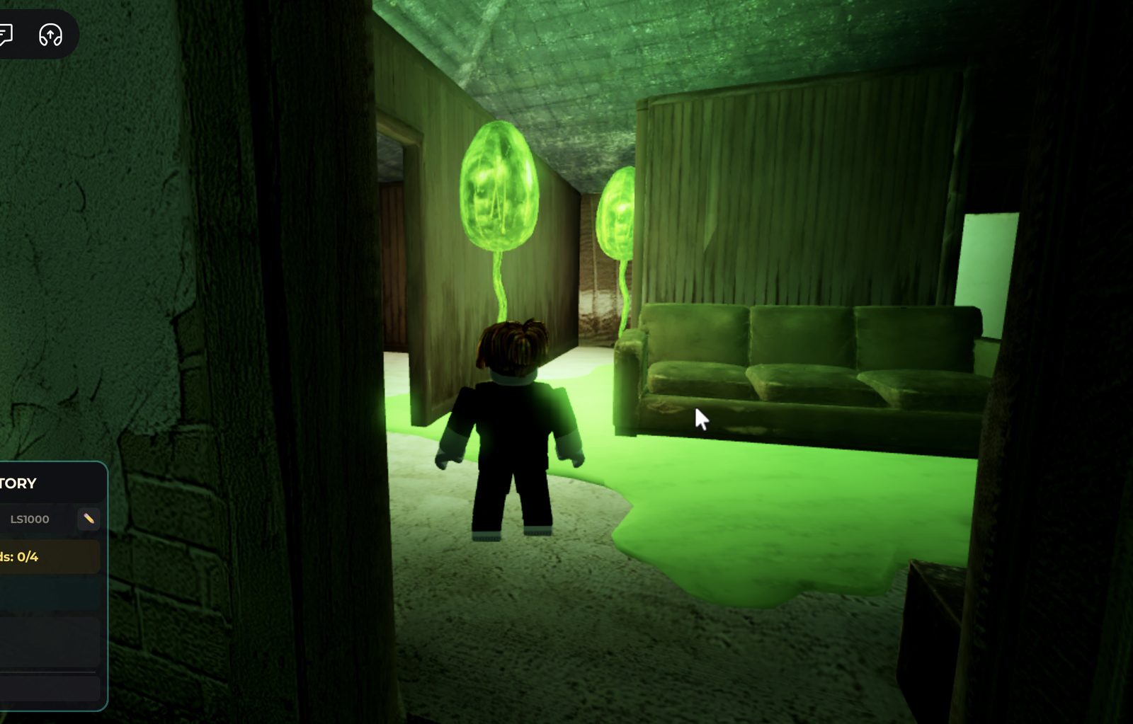 In-game capture inside Carney's House with glowing green Luminite cocoons on the wall, an old couch and a Luminite spill on the floor